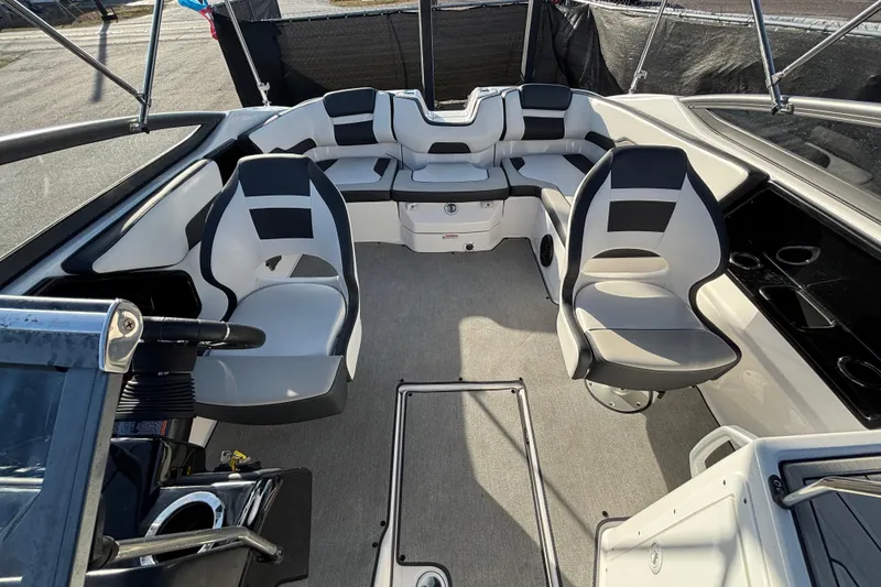 Slide: The Image of 2022 Yamaha Boats SX195 interior with modern seating and sleek design. - 53