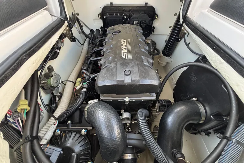 Slide: The Image of Engine compartment of 2022 Yamaha Boats SX195, showcasing the SVHO engine components. - 62