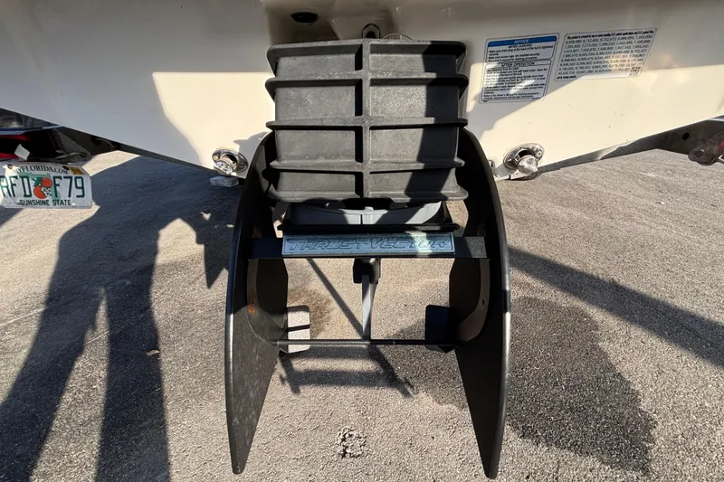 Slide: The Image of Rear view of 2022 Yamaha Boats SX195 with thrust vector fins. - 63