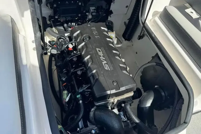 Slide: The Image of Engine compartment of 2022 Yamaha Boats SX195, featuring SVHO engine components. - 7