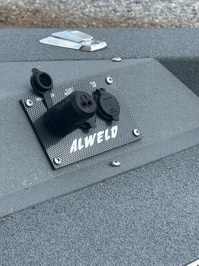 Slide: The Image of Alweld 20 VORTEX 2026 boat console with power outlets. - 8