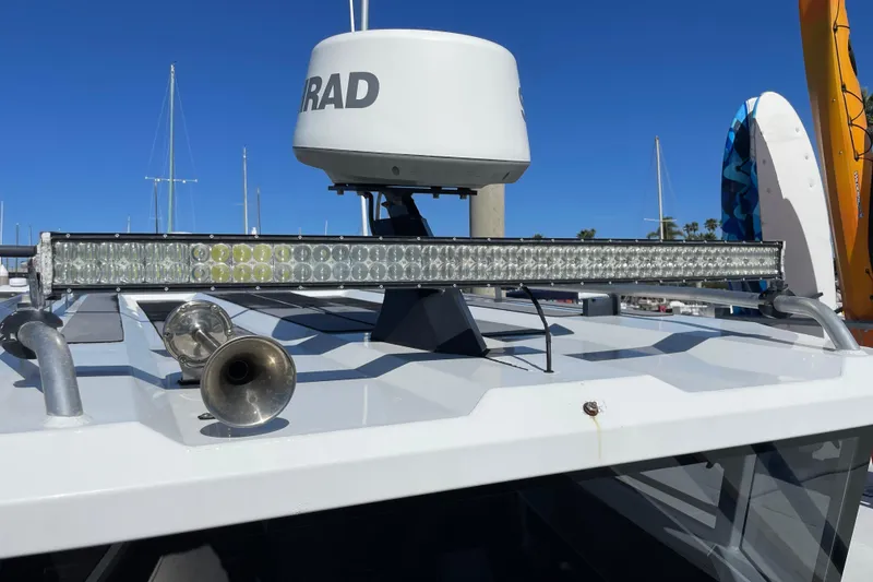 Slide: The Image of 2017 Stabicraft 2500 Ultracab XL docked at marina under clear blue sky. - 12