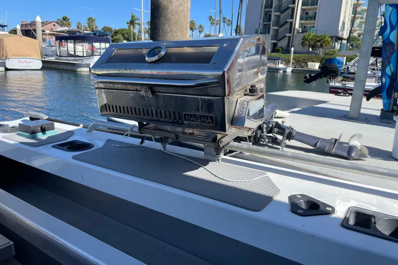 Slide: The Image of 2017 Stabicraft 2500 Ultracab XL boat docked, featuring spacious deck and modern design. - 19
