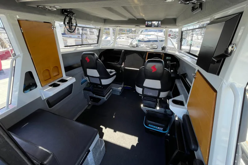 Slide: The Image of Stabicraft 2500 Ultracab XL 2017 with Magma grill at marina dockside. - 23