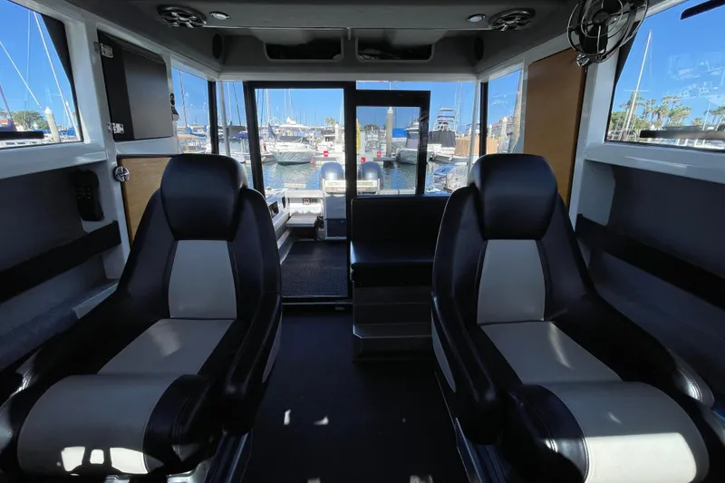 Slide: The Image of Interior of 2017 Stabicraft 2500 Ultracab XL, featuring modern seating and controls. - 27