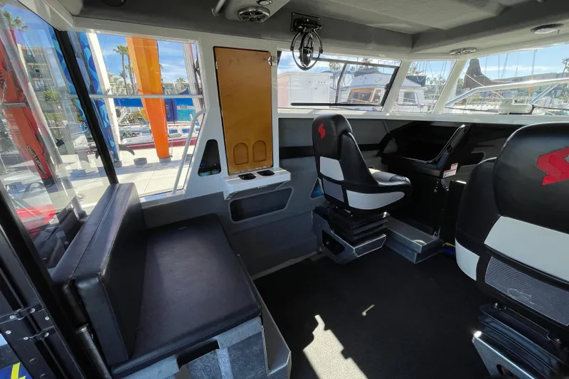 Slide: The Image of Interior of 2017 Stabicraft 2500 Ultracab XL, featuring modern seating and navigation area. - 28