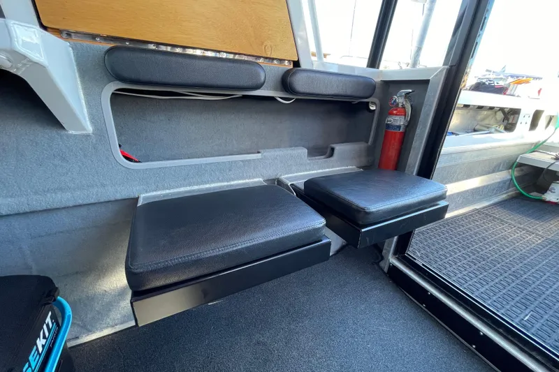 Slide: The Image of Interior of 2017 Stabicraft 2500 Ultracab XL with marina view through windows. - 31