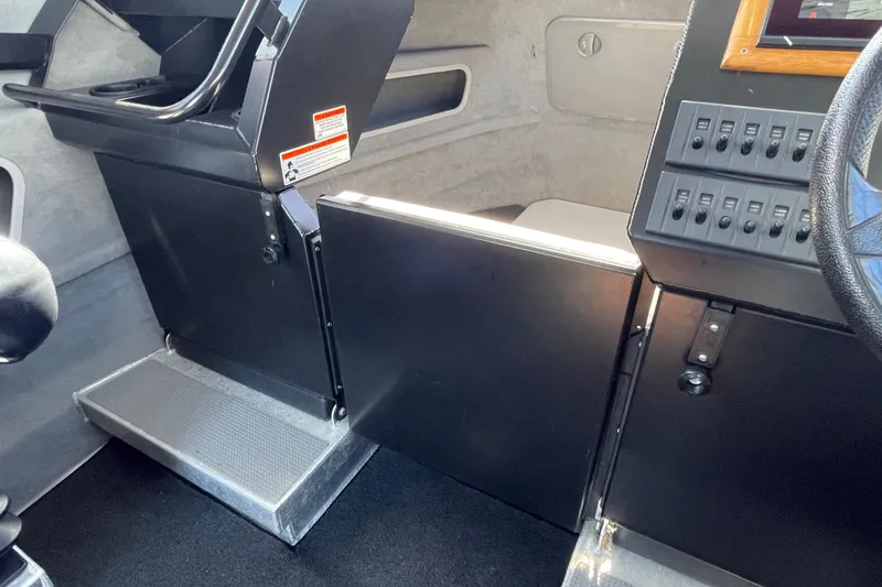 Slide: The Image of Interior view of 2017 Stabicraft 2500 Ultracab XL, docked at marina. - 34