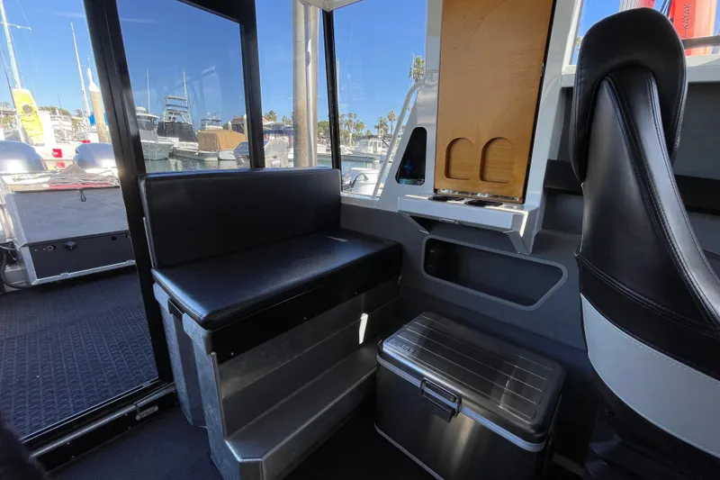 Slide: The Image of Captain's seat in 2017 Stabicraft 2500 Ultracab XL boat interior. - 43