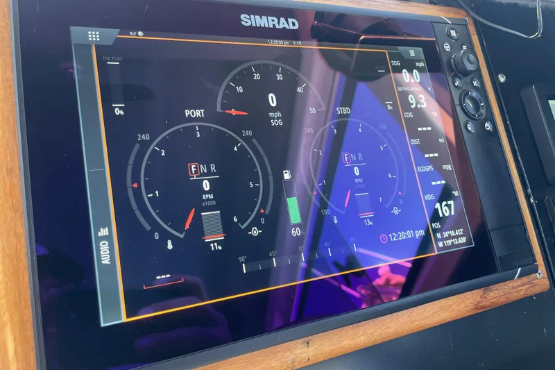 Slide: The Image of Interior view of 2017 Stabicraft 2500 Ultracab XL with marina background. - 49