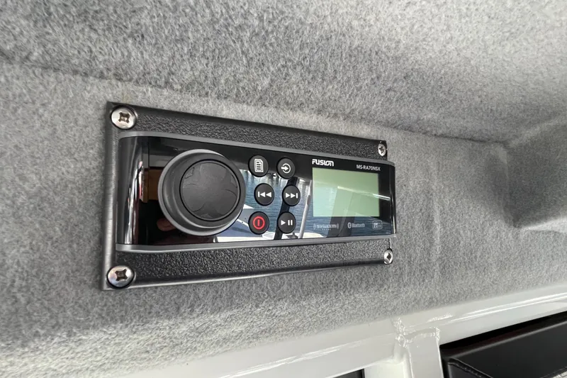 Slide: The Image of Fusion stereo system in 2017 Stabicraft 2500 Ultracab XL boat interior. - 57