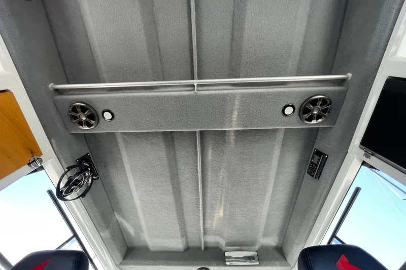 Slide: The Image of Interior ceiling of 2017 Stabicraft 2500 Ultracab XL with speakers and controls. - 59