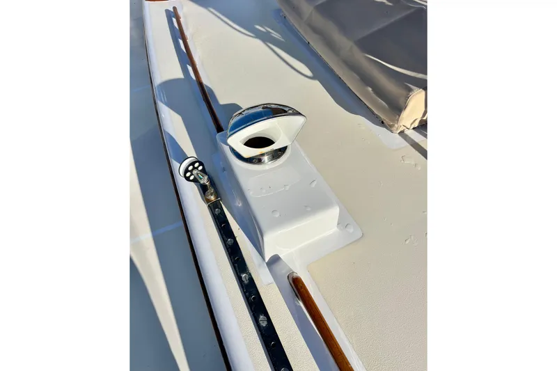Slide: The Image of Deck detail of a 1975 Cape George 36 sailboat, featuring a polished fitting. - 22
