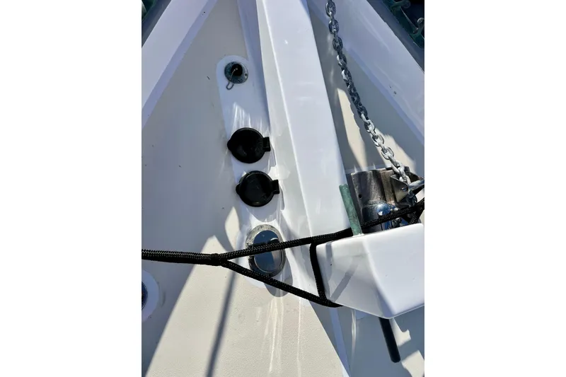 Slide: The Image of Close-up of a 1975 Cape George 36 sailboat deck with anchor chain and fittings. - 27