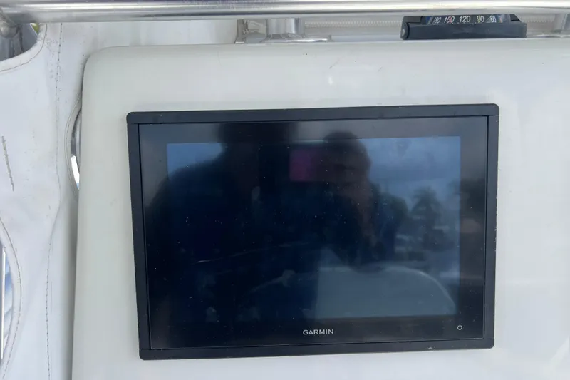 Slide: The Image of Garmin display on 2019 Yellowfin 29 Offshore boat dashboard. - 15
