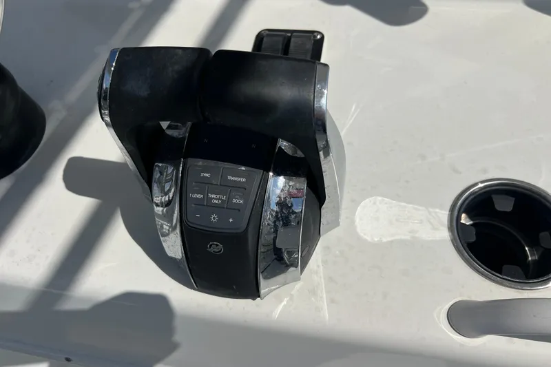 Slide: The Image of Throttle control panel on a 2019 Yellowfin 29 Offshore boat. - 8