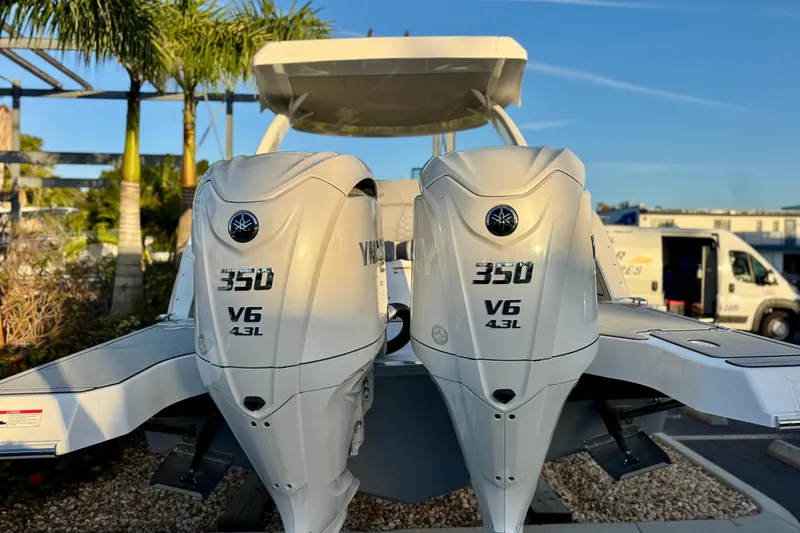Slide: The Image of 2026 Four Winns H33 OB with twin Yamaha 350 V6 outboard engines. - 6