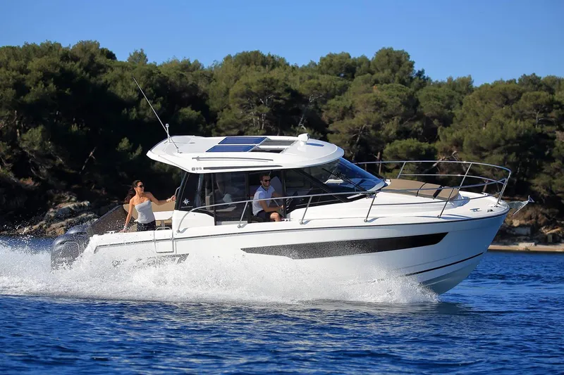 The Image of Manufacturer Provided Image: 2022 Jeanneau NC Weekender 895 cruising on a sunny day. - 0