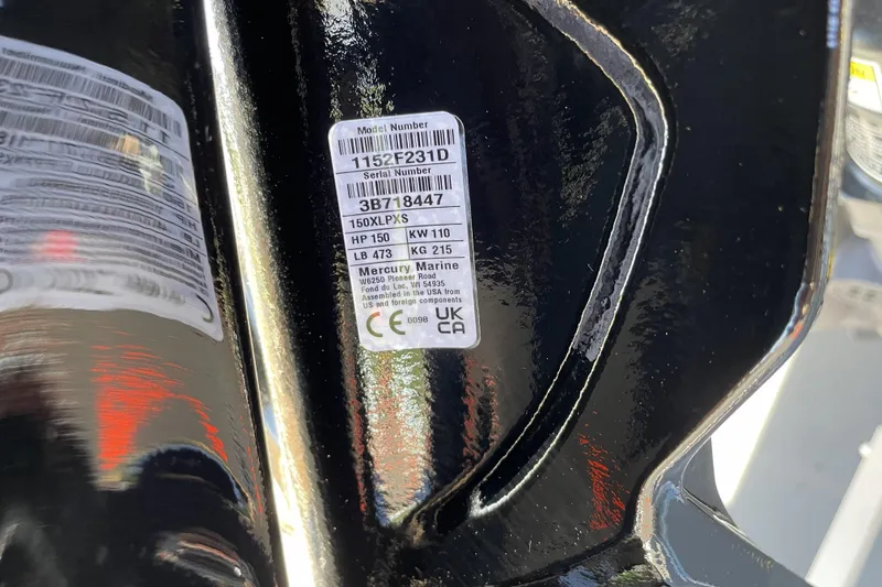 Slide: The Image of Label on a 2026 Mako Pro Skiff 19 CC boat engine, showing model and serial numbers. - 118