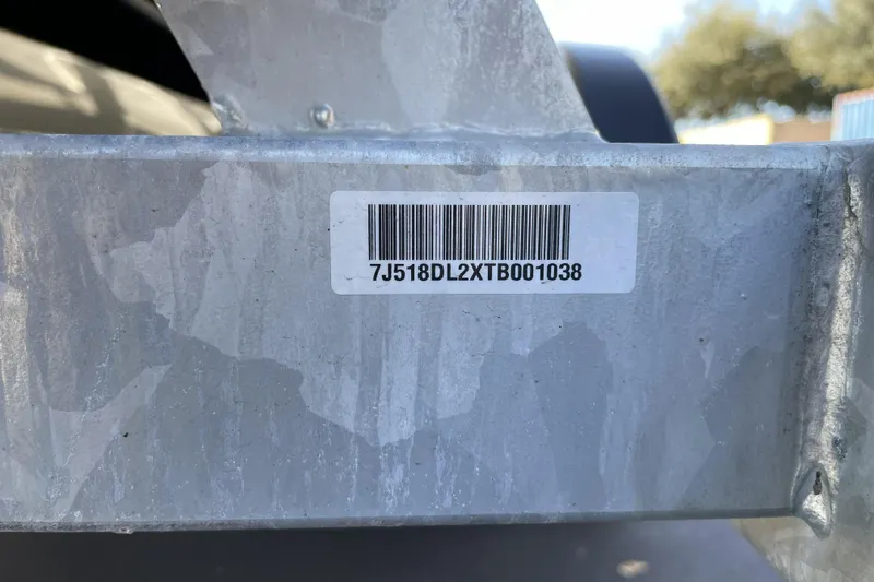 Slide: The Image of Barcode on metal surface of 2026 Mako Pro Skiff 19 CC boat trailer. - 119