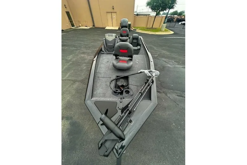 Slide: The Image of 2026 Tracker Pro Team 175 boat with seating and fishing equipment on display. - 4