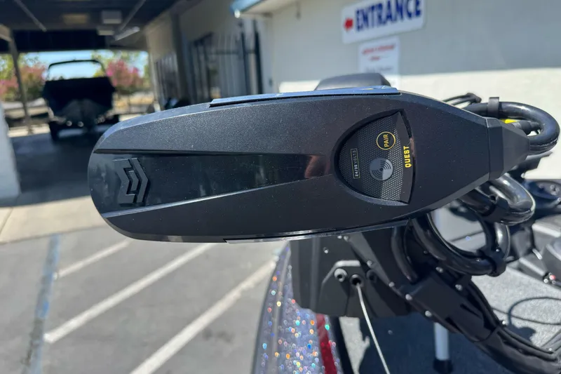 Slide: The Image of Close-up of a 2026 Triton 18 TrX boat component with control panel. - 8