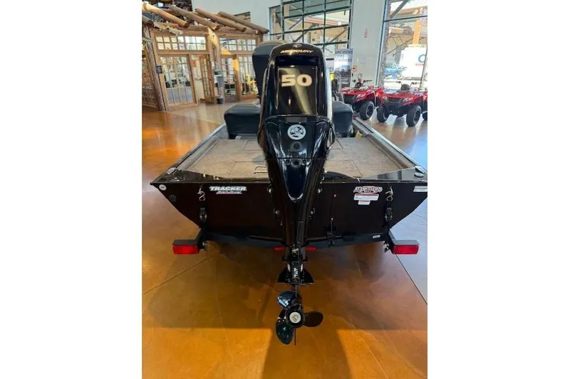 Slide: The Image of 2026 Tracker Bass Tracker Classic XL boat with Mercury 50 engine in showroom. - 4