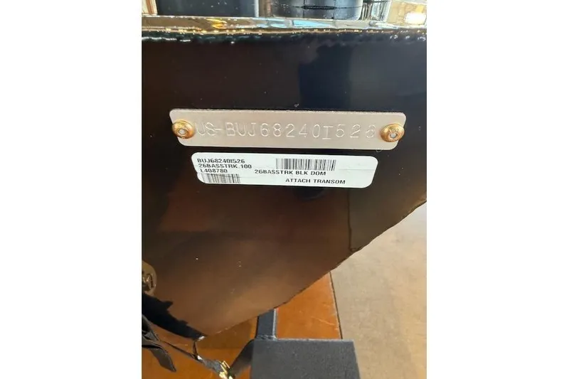 Slide: The Image of 2026 Tracker Bass Tracker Classic XL transom with identification plate and label. - 9