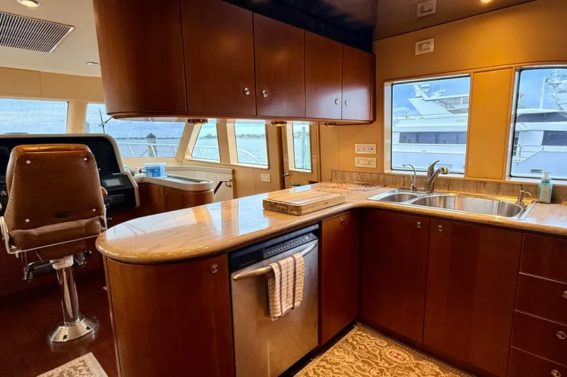 Slide: The Image of Luxurious kitchen interior of 2002 Cheoy Lee 72 Raised Pilot House Motor Yacht. - 16