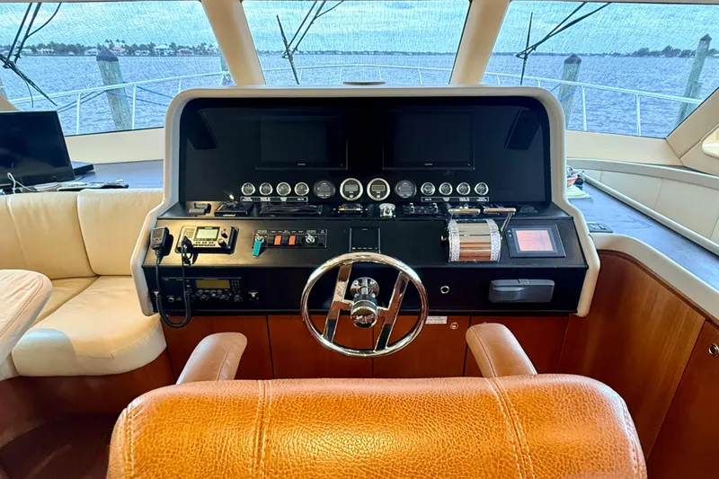 Slide: The Image of Pilot house of 2002 Cheoy Lee 72 Raised Motor Yacht with steering wheel and control panel. - 20