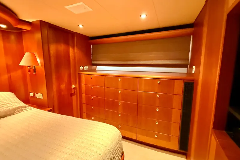 Slide: The Image of Luxurious wooden interior of 2002 Cheoy Lee 72 Raised Pilot House Motor Yacht bedroom. - 23