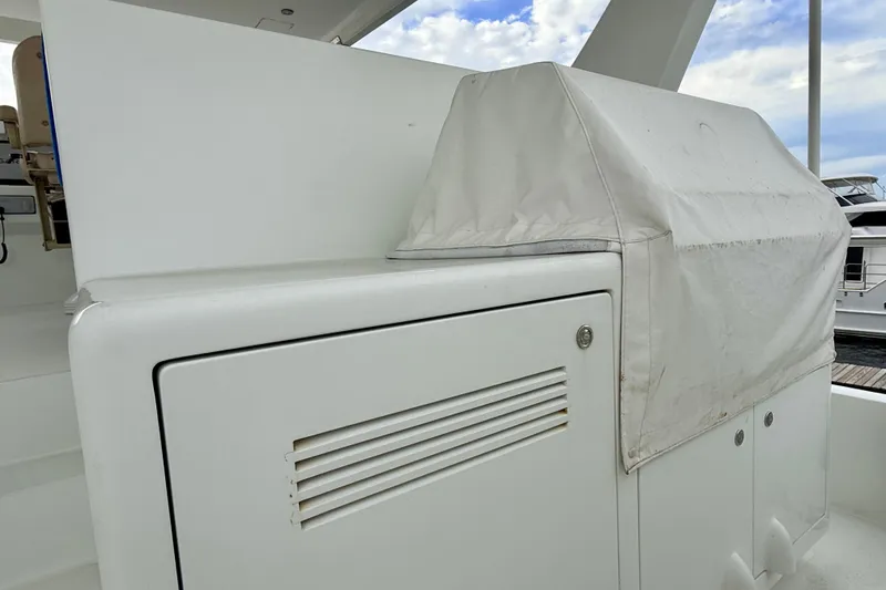 Slide: The Image of 2002 Cheoy Lee 72 Raised Pilot House Motor Yacht, covered equipment on deck. - 42