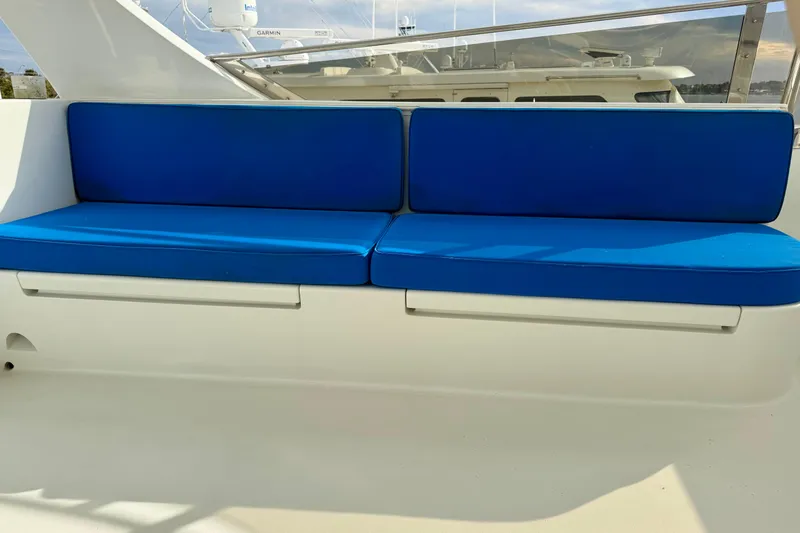 Slide: The Image of Blue cushioned seating on 2002 Cheoy Lee 72 Raised Pilot House Motor Yacht deck. - 44