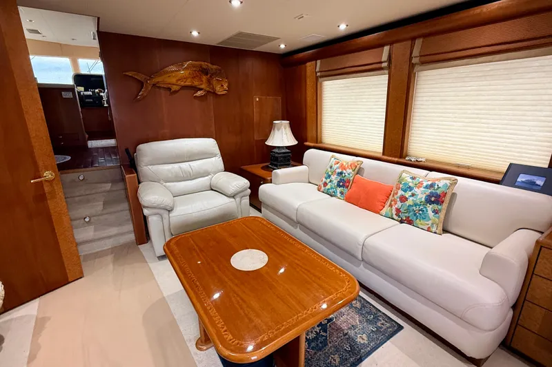 Slide: The Image of Luxurious interior of 2002 Cheoy Lee 72 Raised Pilot House Motor Yacht, featuring elegant seating and decor. - 7