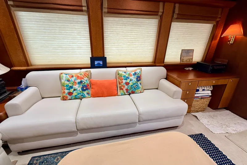 Slide: The Image of Luxurious interior of 2002 Cheoy Lee 72 Yacht with elegant sofa and vibrant cushions. - 8
