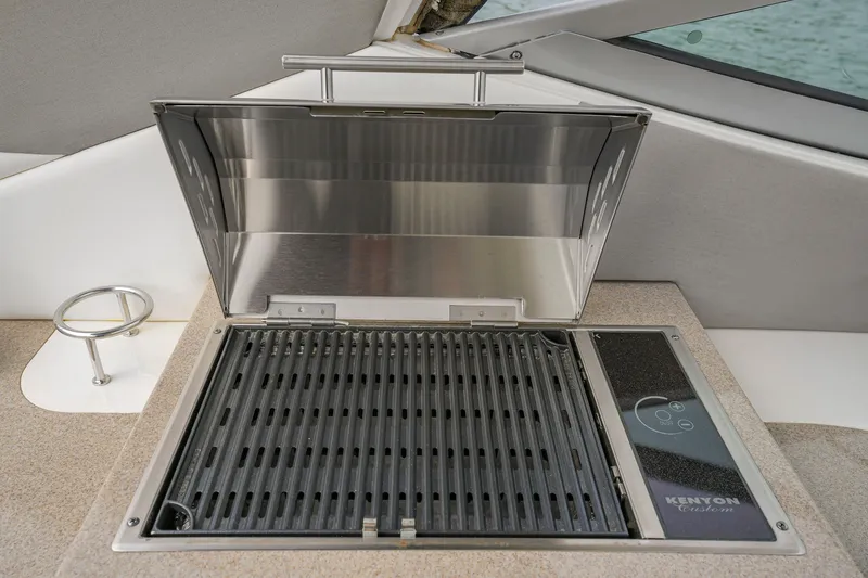 Slide: The Image of Built-in grill on 2007 Sea Ray 310 Sundancer boat deck. - 19