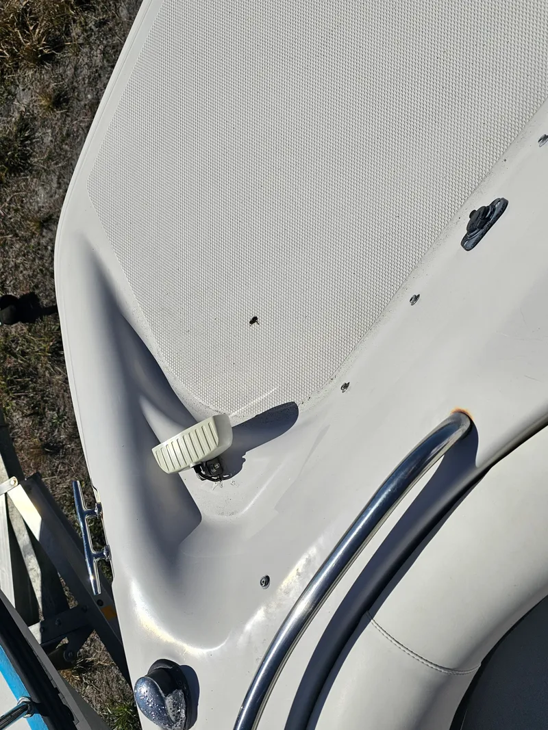 Slide: The Image of Close-up of a 2002 Godfrey Hurricane Sundeck 187 boat deck. - 14