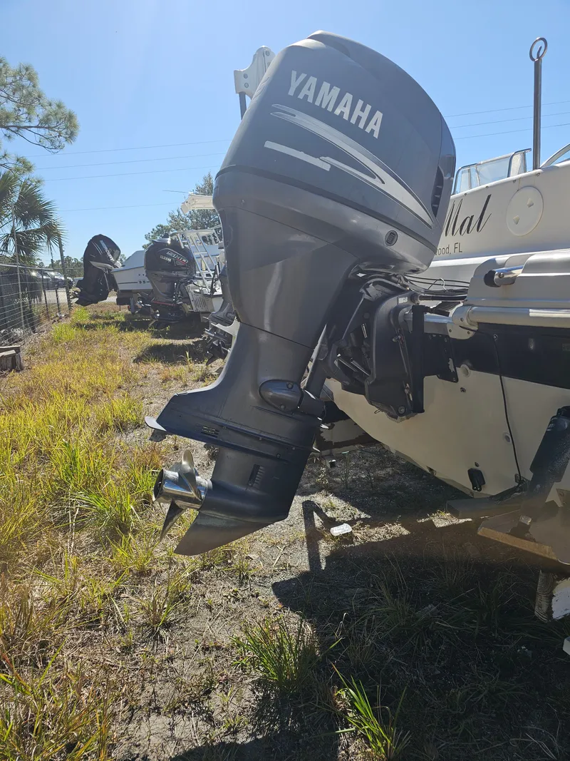 Slide: The Image of Yamaha outboard motor on a 2002 Godfrey Hurricane Sundeck 187 boat. - 21