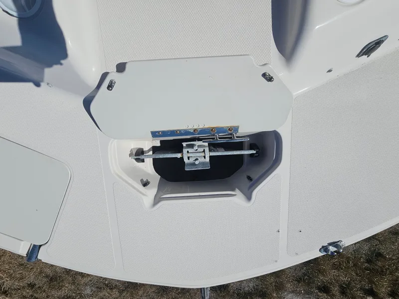 Slide: The Image of Anchor compartment of a 2002 Godfrey Hurricane Sundeck 187 boat. - 6