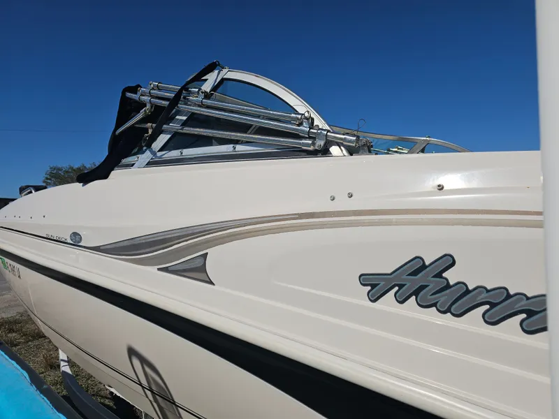 Slide: The Image of 2002 Godfrey Hurricane Sundeck 187 boat, side view. - 8