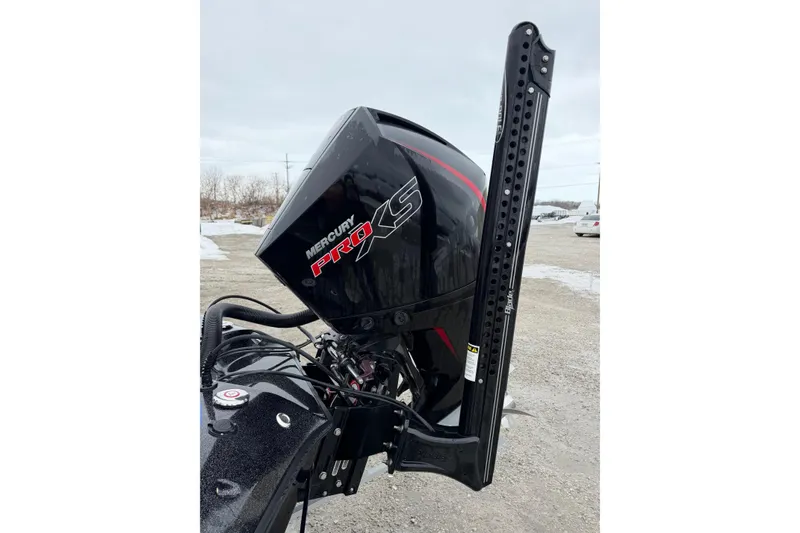 Slide: The Image of 2023 Blazer 650 Pro Tour with Mercury Pro XS engine, parked on gravel. - 9