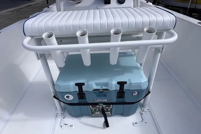 Slide: The Image of 2008 Angler PANGA 22 boat interior with rod holders and cooler. - 13