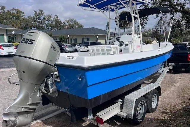 Slide: The Image of 2008 Angler PANGA 22 boat with Honda 225 engine on trailer. - 4