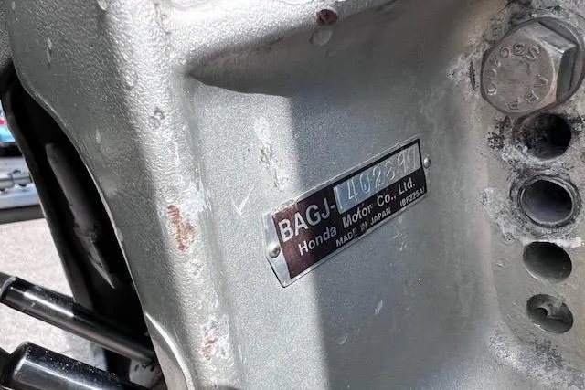 Slide: The Image of Close-up of a Honda motor serial plate on a 2008 Angler PANGA 22 boat. - 8