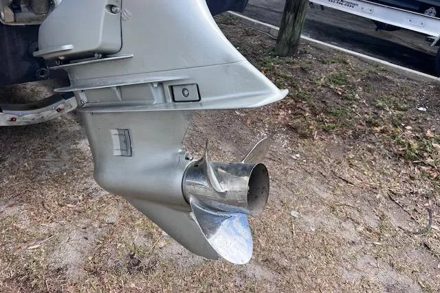 Slide: The Image of Outboard motor propeller of a 2008 Angler PANGA 22 boat on dry land. - 7