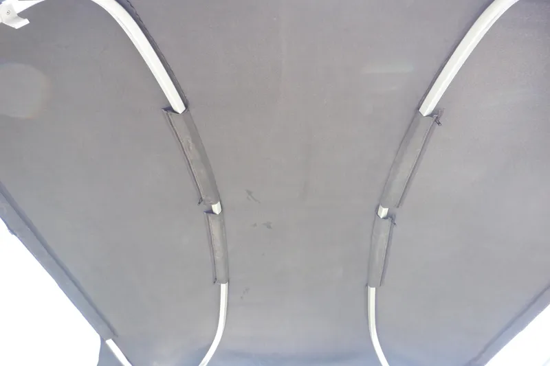 Slide: The Image of Bimini top of 2009 Premier 225 Sunsation LTD pontoon boat, viewed from below. - 14