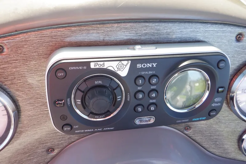 Slide: The Image of Sony marine stereo system on 2009 Premier 225 Sunsation LTD boat dashboard. - 28