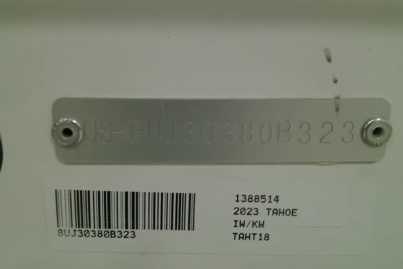 Slide: The Image of 2023 Tahoe T18 identification plate with serial number and barcode. - 7