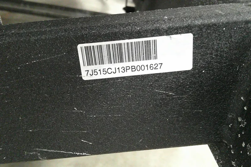 Slide: The Image of Barcode label on 2023 Tahoe T18, displaying serial number 7J515CJ13PB001627. - 8