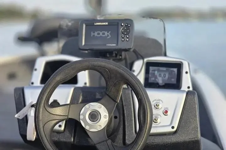 Slide: The Image of Steering console of 2025 Tracker Pro Team 175 Crappie Edition boat with navigation system. - 20